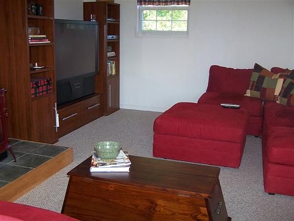 FR has a brick and  slate hearth for the gas-fired stove and  sliding glass do