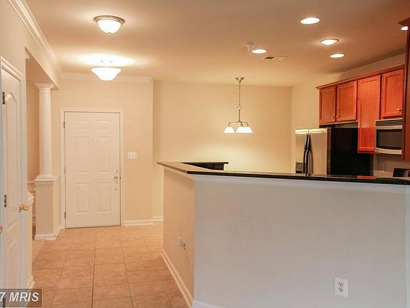 5th image of 9712 Handerson Pl Unit 202