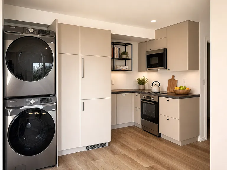 Open kitchen with full-size appliances and in-unit Samsung washer/dryer