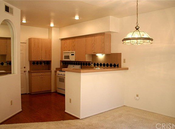 Open kitchen with breakfast bar