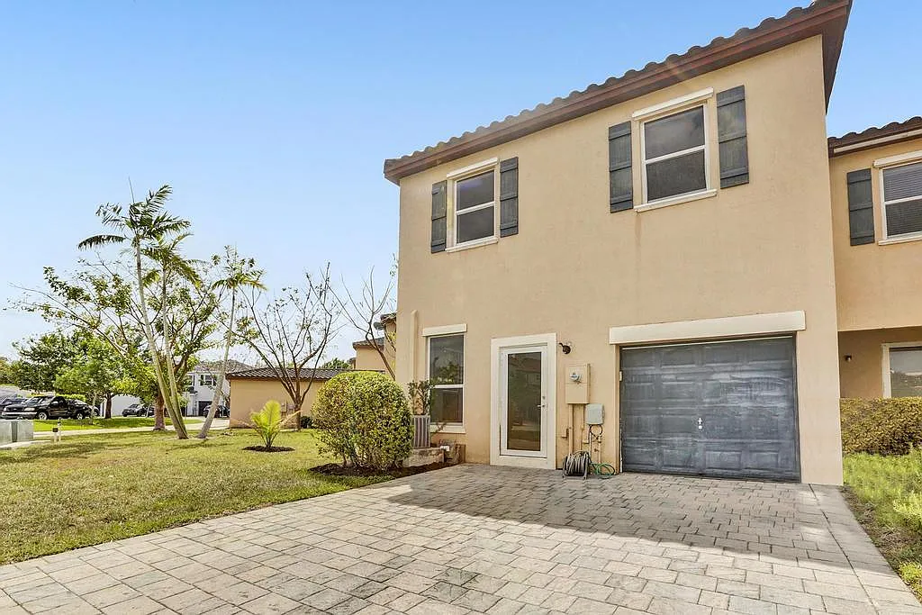 Photo 2 of 44 - 9081 SW 169th Path - Miami, FL Building Photo - 9081 SW 169th Path
