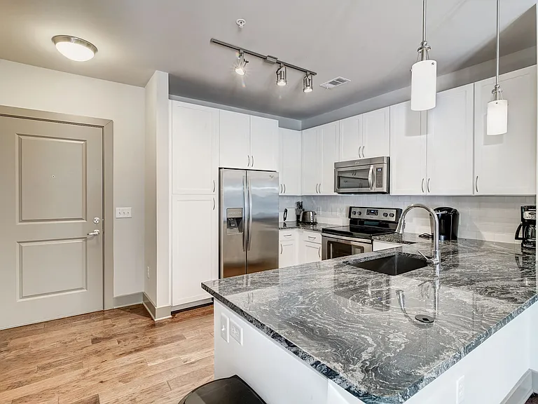 Granite Countertops with Elegant Backsplash