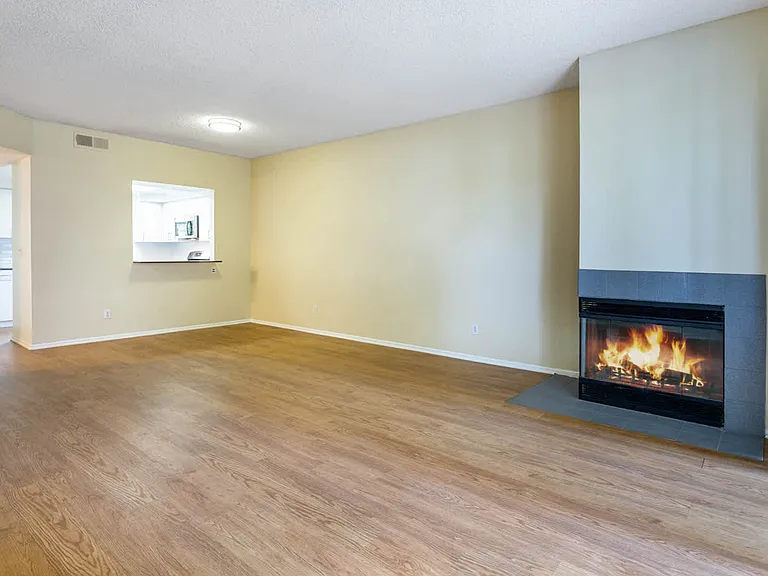 Living Room with Fireplace and Hard Surface Flooring
