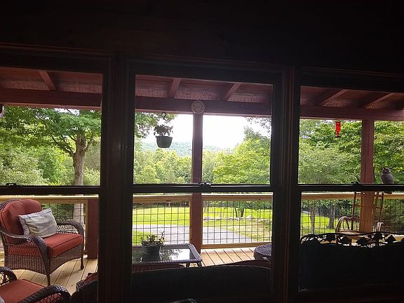 LR view out to porch setting