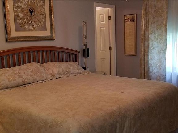 Master bedroom with bath at the back.