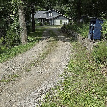 Driveway to house from road