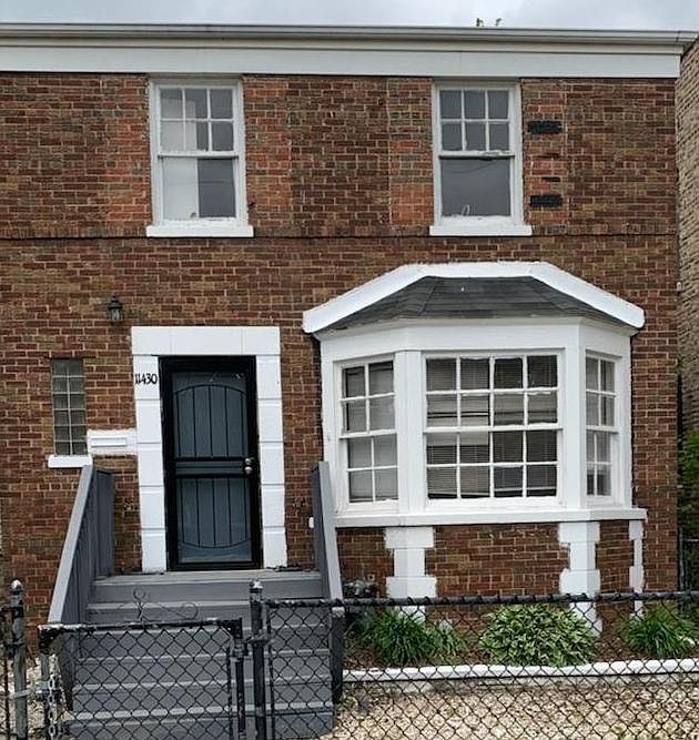 Victorian style home with side entry