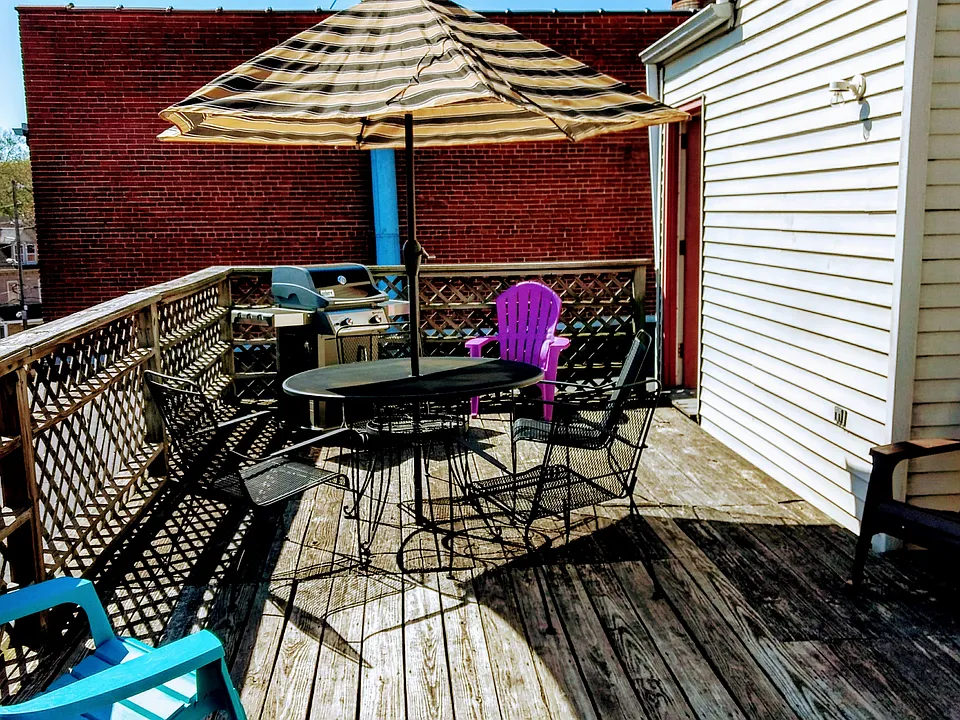 The Uptown Lofts Common Rooftop Deck with Gas Grill & Patio Furniture