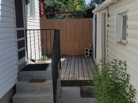 Deck with Storage Shed behind garage