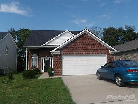 127 Dunlap, Georgetown, KY  This brick and vinyl siding home backs up to a farm