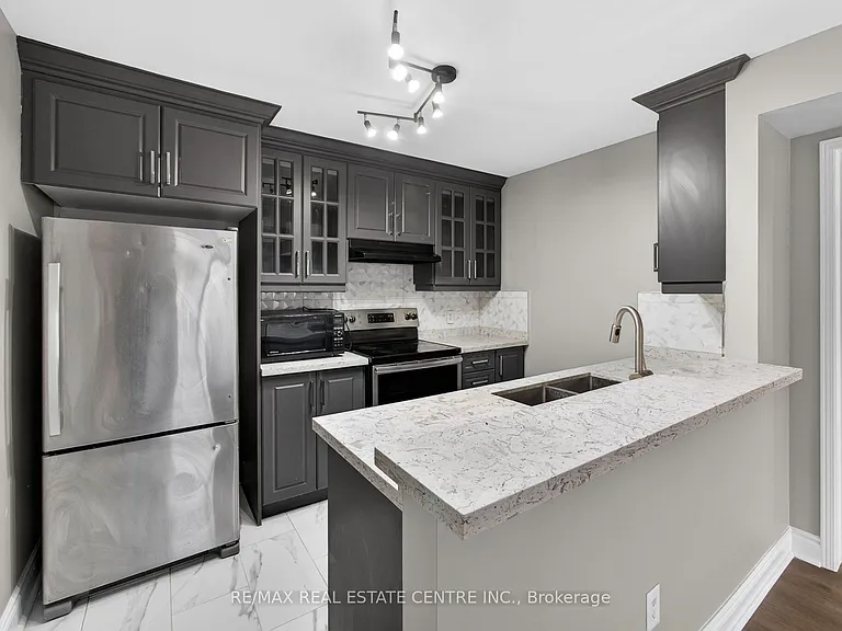 5035 Oscar Peterson Blvd #105 — Photo 11