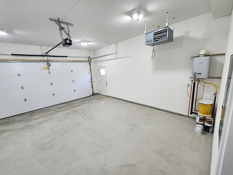 Two car garage with heater.