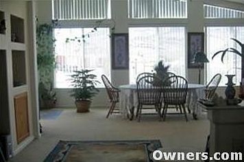 LIVING ROOM WITH LRG WINDOWS