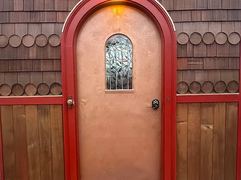 Welcome to the Lucky Penny! The doorbell to the left is made from a copper bike bell. There's a little copper piece next to the door lever that says "Home, Sweet Home."
