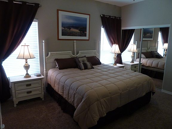 Master bedroom - king size bed. The drapes are blackout.