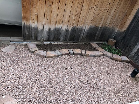 Small front yard. Easy to maintain yet room for flowers, quiet evenings on the large porch, etc