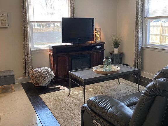 Living room & side entrance.