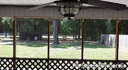 View to backyard
						:
						View to backyard. note the huge pile of firewood for firepit.