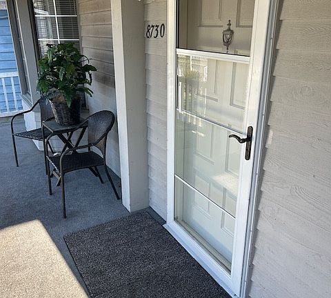 Front entrance with comfortable spacious front porch