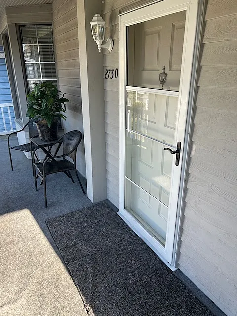 Front entrance with comfortable spacious front porch