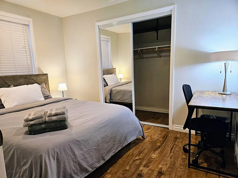 Queen bed & office desk in each room