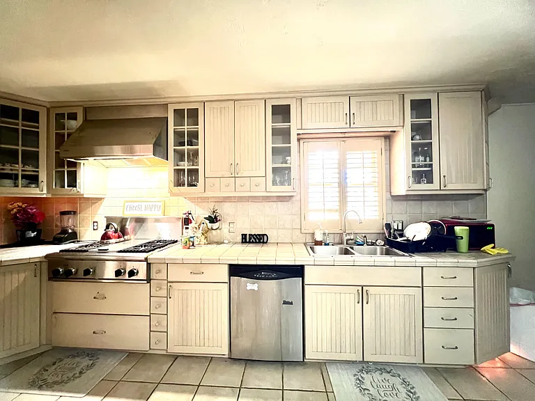 assigned cabinet and kitchen area