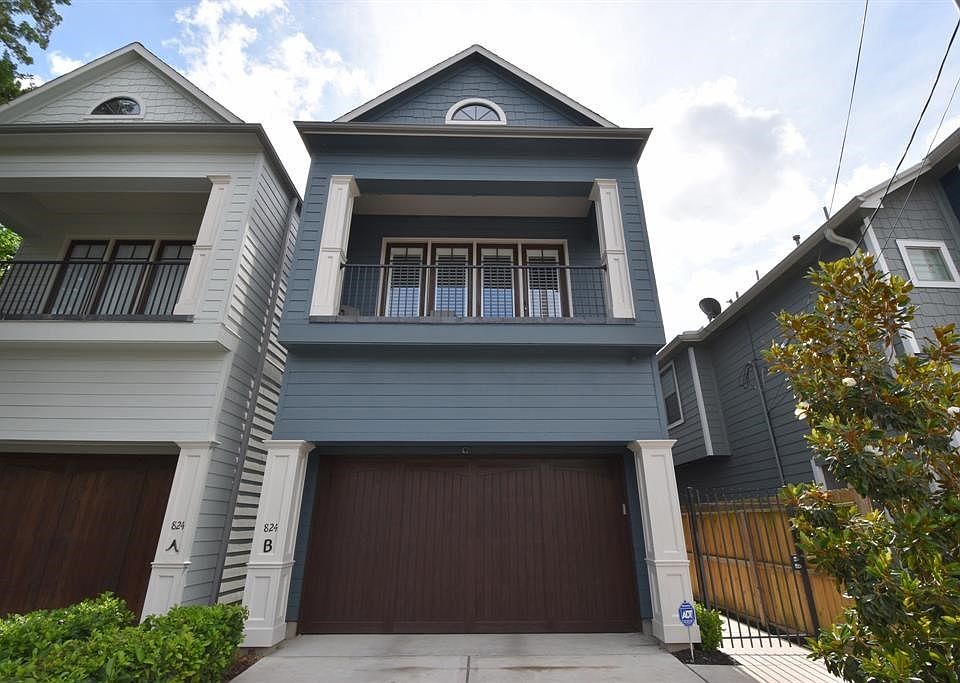 Traditional elevation in Heights with large second floor balcony
