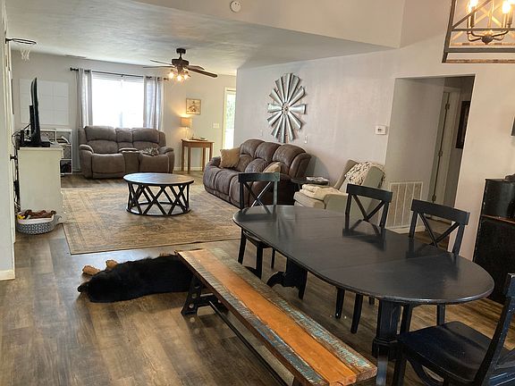 Living and Dining Room. Hall way to downstairs 2nd and 3rd bedrooms and hall bathroom