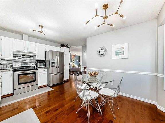 5th image of 71 E Macewan Glen Rd NW