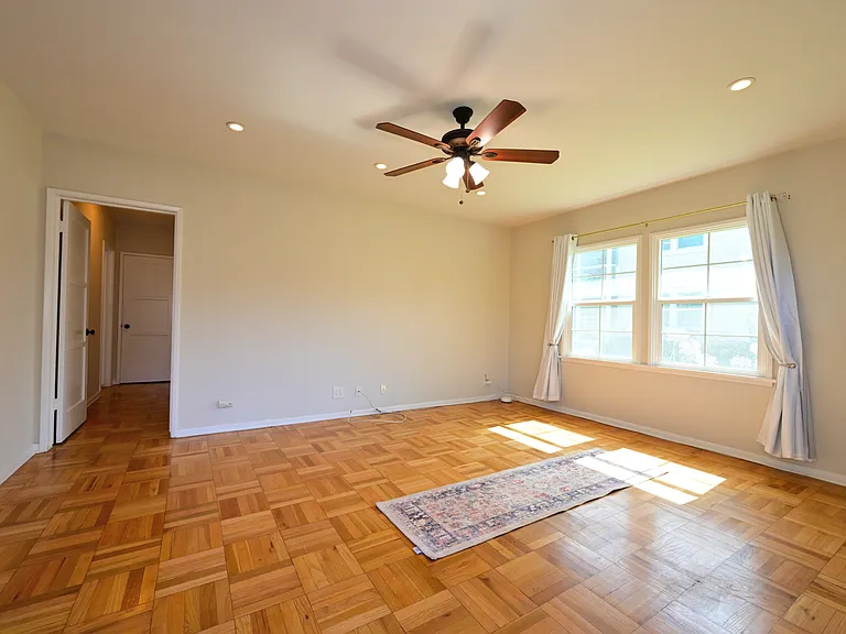fully upgraded and bright w/ parquet hardwood flooring + mini split hvac + in-unit laundry