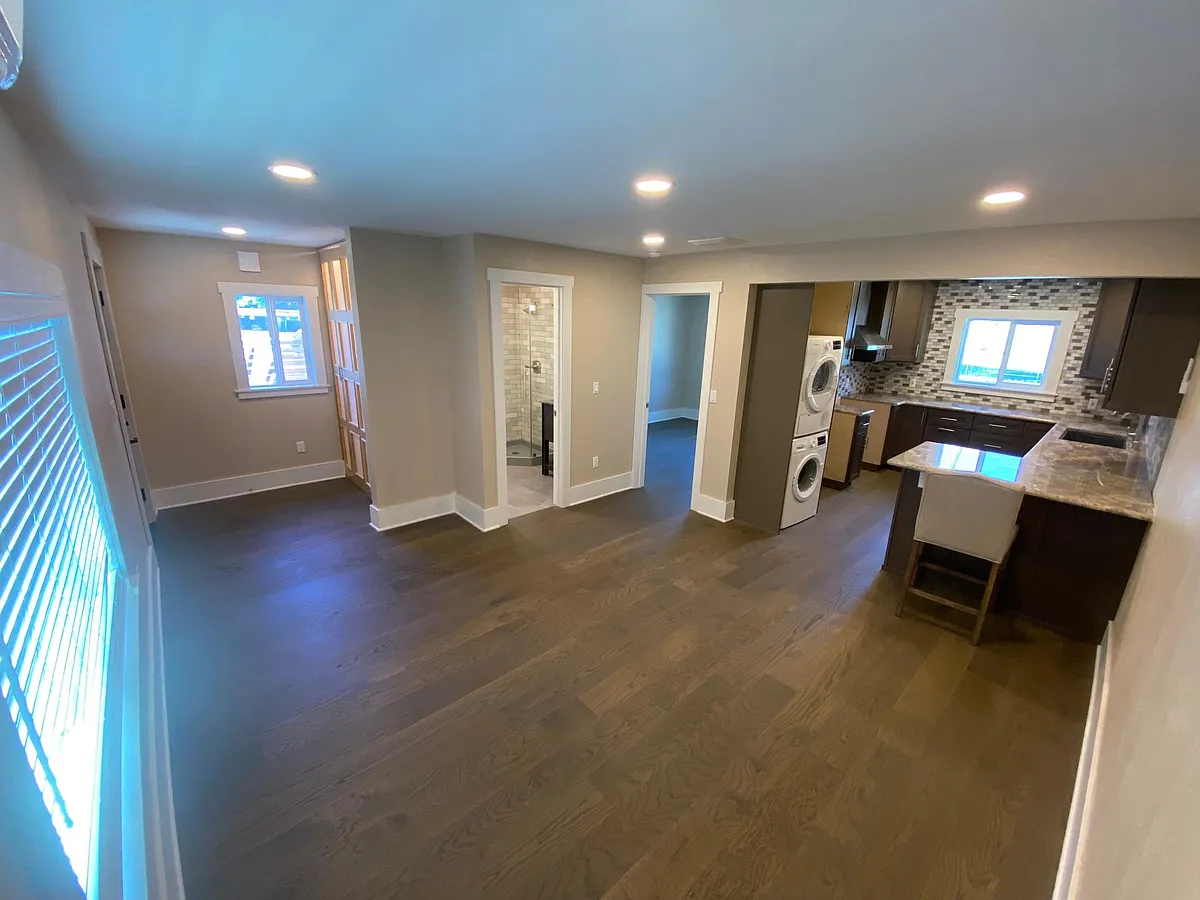 Living room with kitchen to the right, bedroom in the corner, bath and entrance to the left with a closet for storage. - 13849 1/2 S McClure Ave