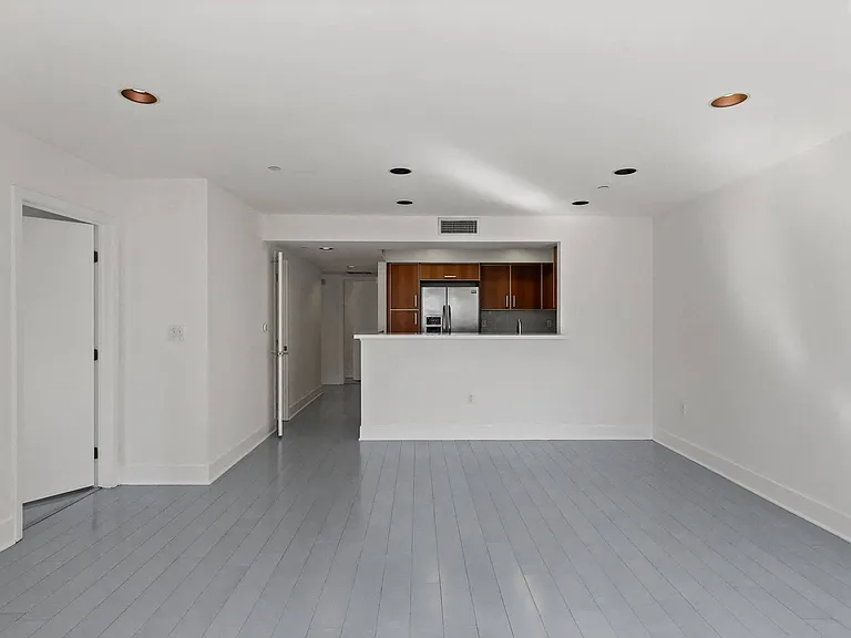 Open-Concept Living, Dining, And Kitchen Areas
