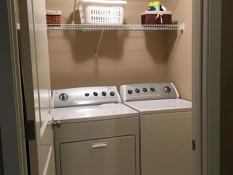 Includes washer & dryer, ample shelf storage