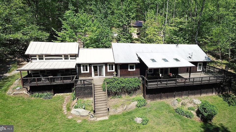 PRIVATELY SET ON 3-ACRES