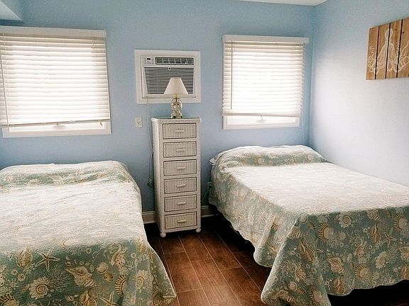 Bedroom with two full size beds