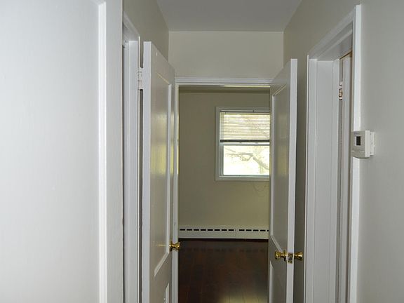 Hallway to bedroom and bathroom