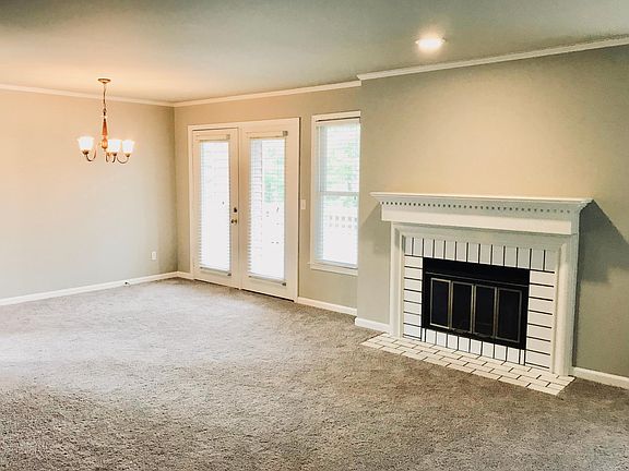 Large living area with attached dining area.