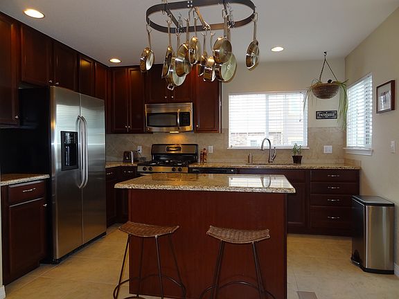 Upgraded Kitchen with Slab Granite, 42" Cabinets and Island