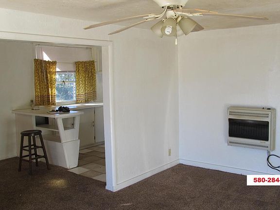 Living room looking into kitchen