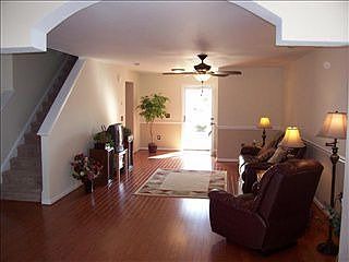 Looking from bonus room into living room