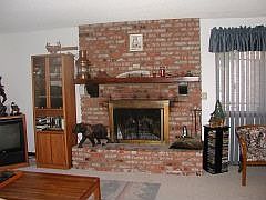 Brick ceiling-to-floor fireplace
