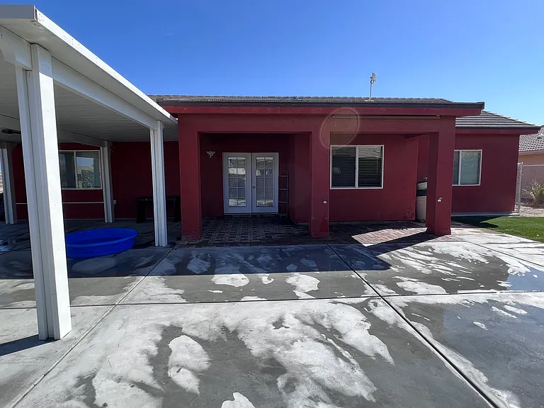 Backyard double doors entry.