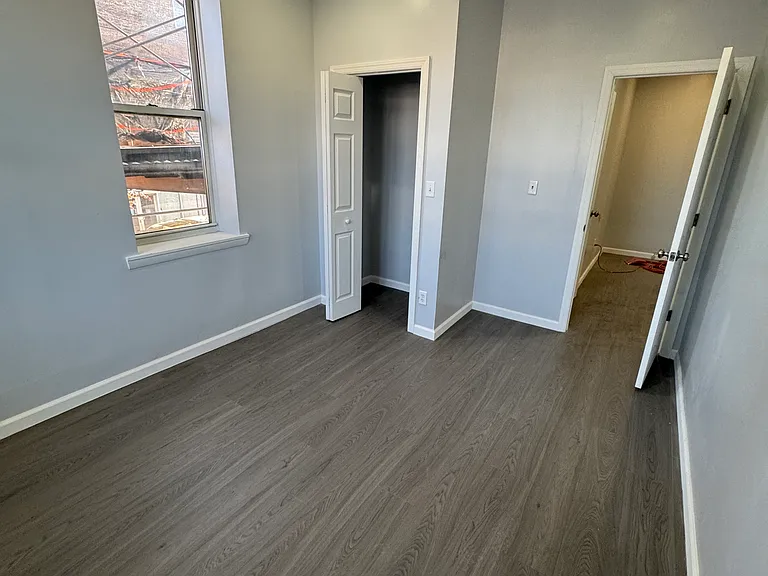 E 8th St — Photo 11