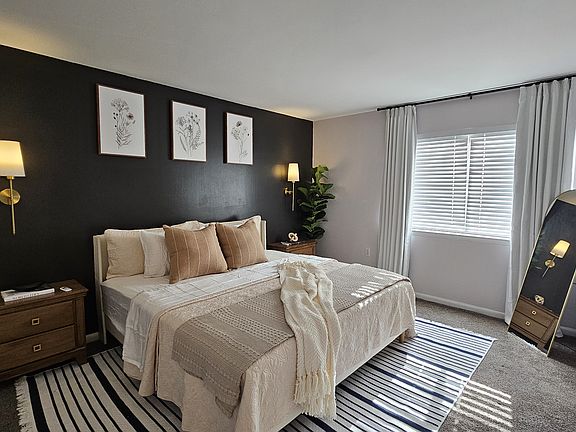 Bedroom with king sized bed.