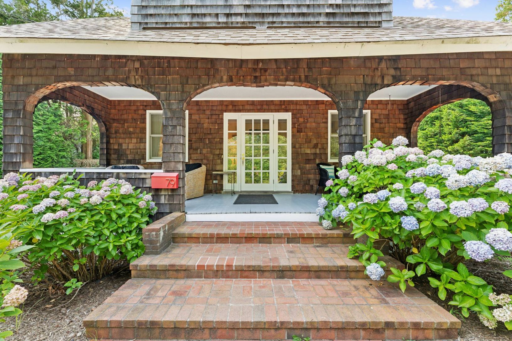 Welcoming front porch with porch swing