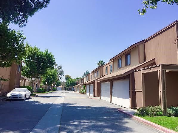 1st image of 12828 Ramona Blvd Unit 105