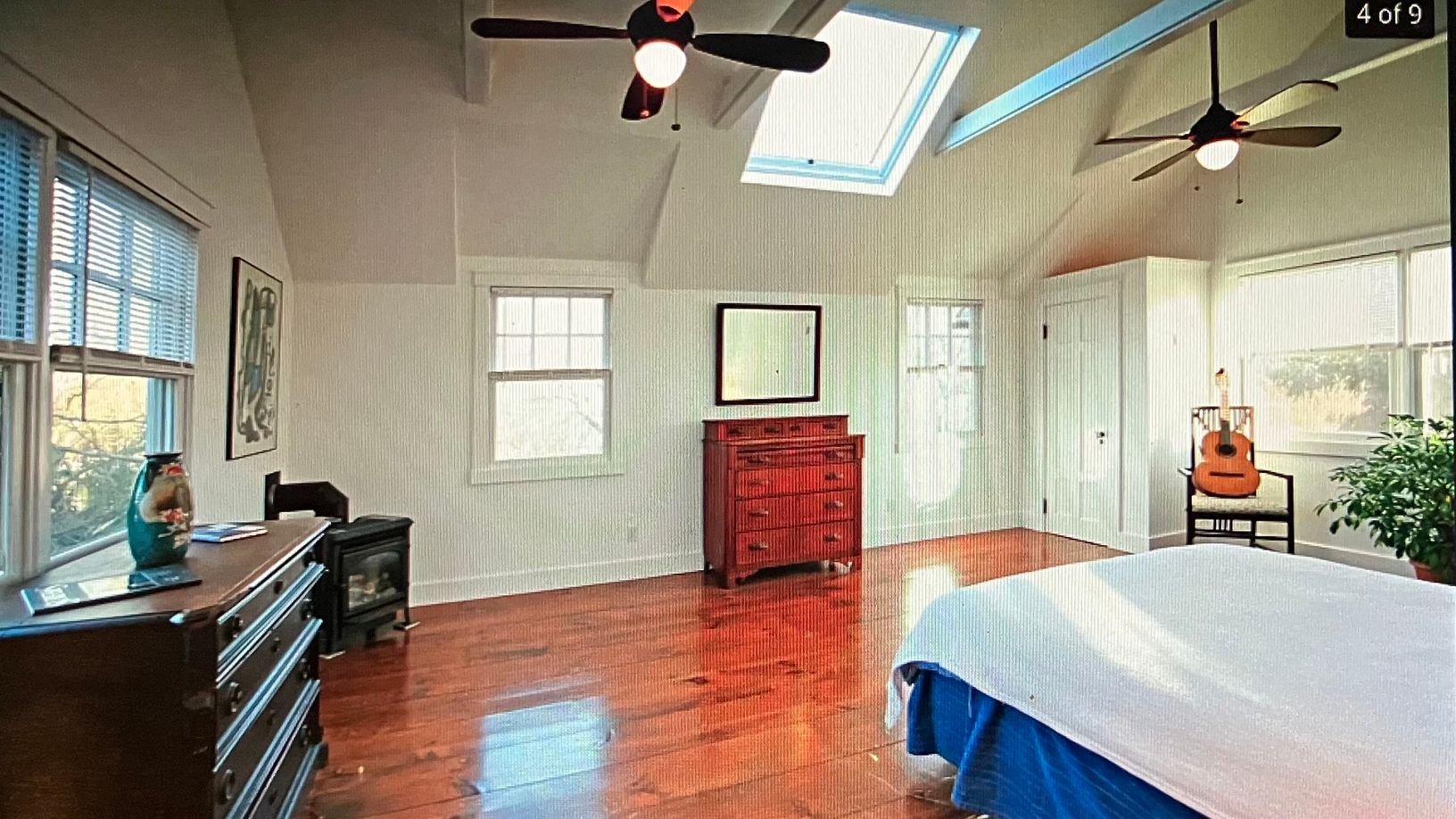 X Large Master bedroom south, north and west facing, Gas cast iron stove.