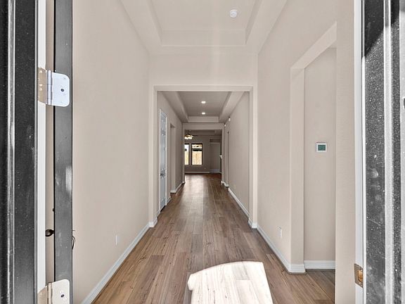 Welcome home! Step inside through the inviting entryway that seamlessly flows into the open-concept