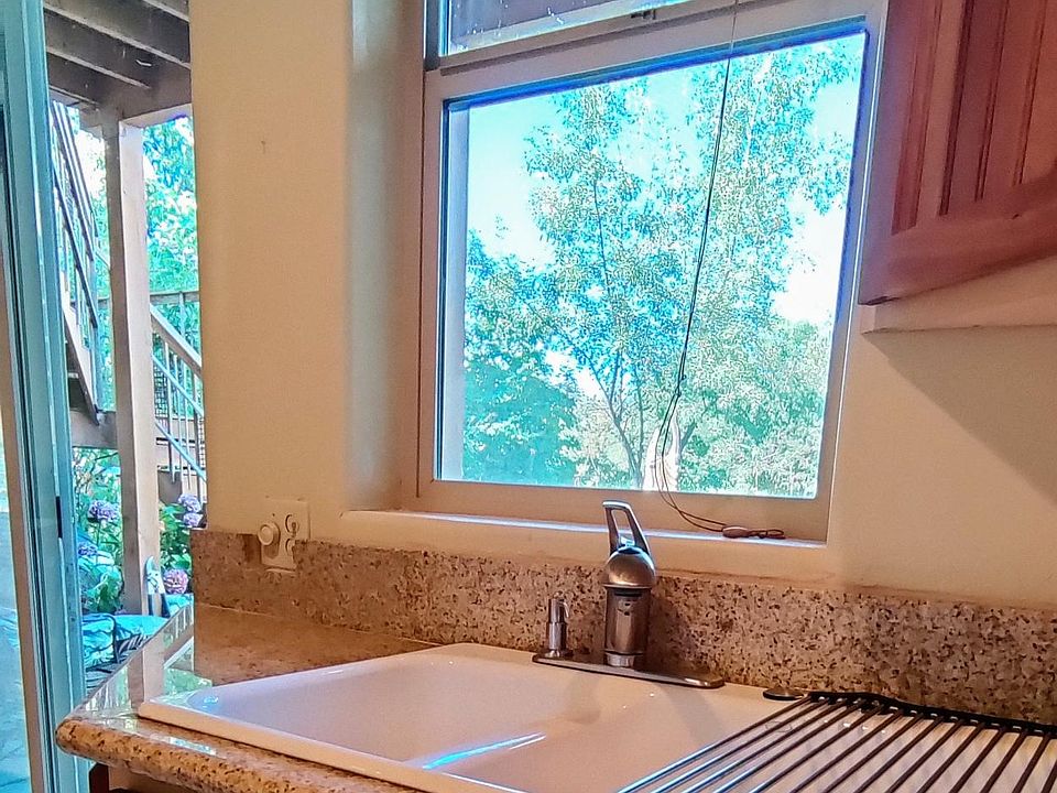 Green views from every window. Granite countertops, dishwasher and pantry in full kitchen.