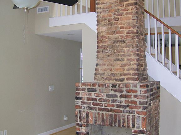 Living room - original fireplace, sealed now with gas logs.